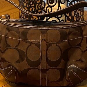 Authentic Coach Brown Handbag . Gently used still in good condition.